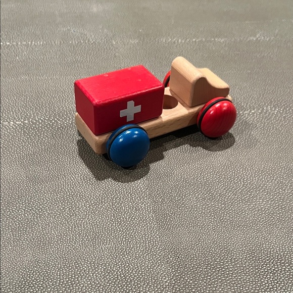Classic Wooden Toy Ambulance with Red and Blue Wheels - Picture 2 of 4
